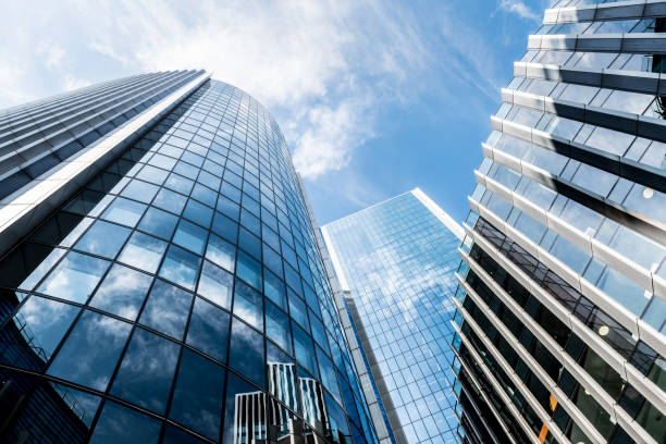 Directly below view of financial buildings in the City of London.